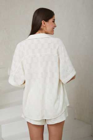 White checker pattern shirt
